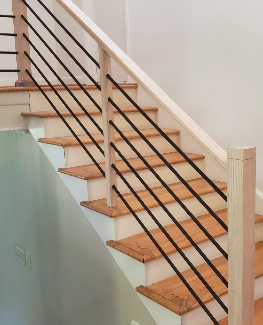 matar-holdings-wooden-stairs